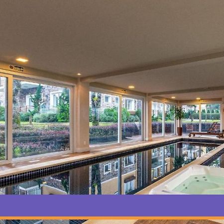 Rosa Edificio Casa De Pedra Lejlighed Gramado Eksteriør billede